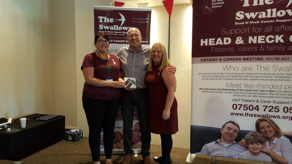 Chris donating a phone from SimPal to nurses in Blackpool for their 24/7 helpline.
