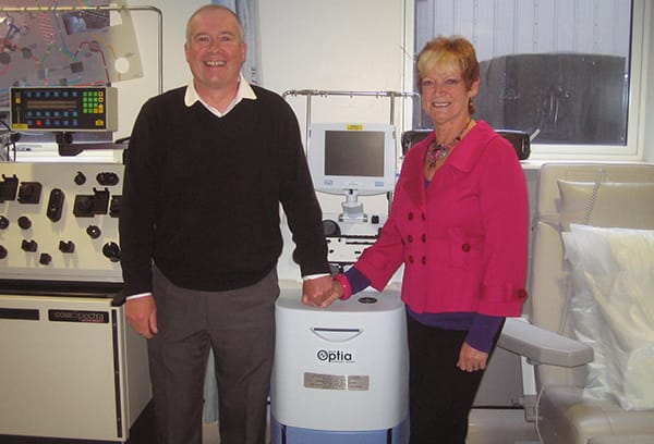 Chris and Sue with apheresis machine purchased from fundraising for St Georges hospital